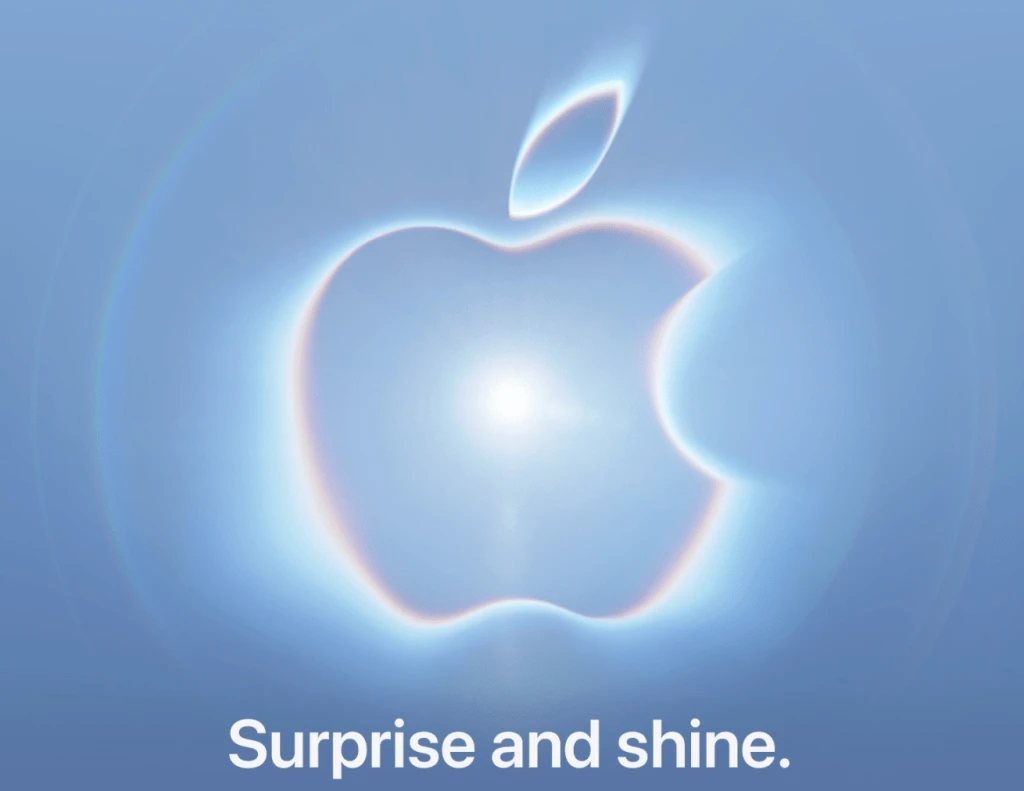 Biểu trưng Apple màu bạc xanh trên nền tối